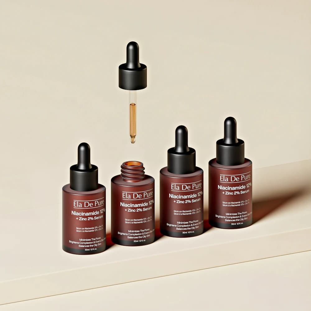 Amber serum bottles with glass droppers on a neutral surface